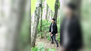 Bad boy jerks while smoking cigarette in a forest - almost caught - so his balls stay full
