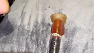 Femboy gets his butt spread with giant fake penis while dressed in milky underwear