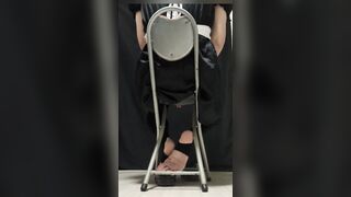 A man in a maids uniform lures you by flashing off the feet of his soles thru his pantyhose!