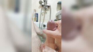 Timid Racoon fumbles his infrequent pink cigar in the bath