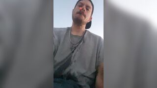 Smoking a cigar while tailgating out in the middle of nowhere doused