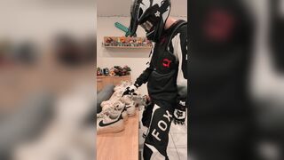 Mx Guy shoves his spear into the sneakers and crams them.