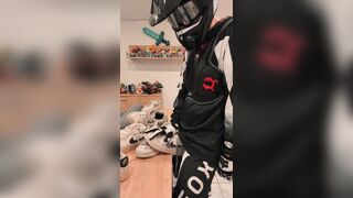 Mx Guy shoves his spear into the sneakers and crams them.