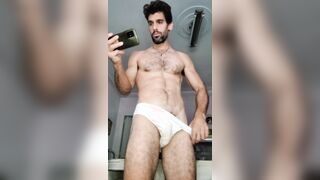 Wooly muscled guy milking off and jiggling powerfully