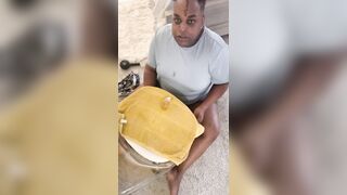 Lounging to his doll