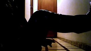 Spandex Sissy in high-heeled shoes tears up booty with dual faux-cock