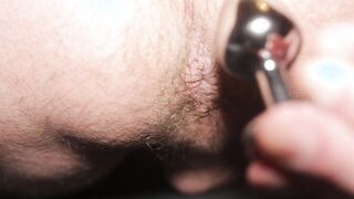 Close up of frolicking with speculum in brown sphincter