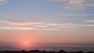 Splendid sunset on a public beach