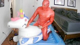 Inflatable fucktoy rail to jizm in crimson spandex catsuit