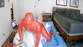 Inflatable fucktoy rail to jizm in crimson spandex catsuit