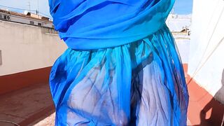 Doing workout in semi-transparent sundress in a public place