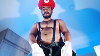 Clothed as Mario Bros frolicking with my poking implement