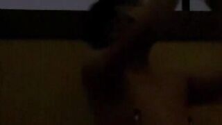 Sissy stud manacled and encaged in v-card on balcony.