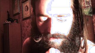 dude with facial hair eating coochie