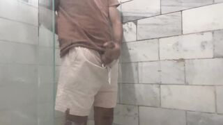 A rapid cum shot in the shower sans anyone watching!