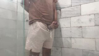 A rapid cum shot in the shower sans anyone watching!
