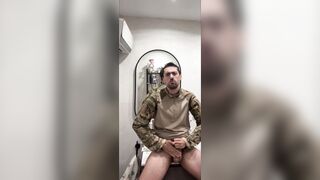 Military stud 2 arms masturbates his meat