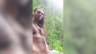 Masterbating outdoors by some magnificent waterfalls