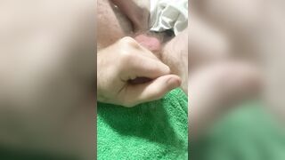 Waking up at 4am with a rampant schlong, I masturbated my hard-on and blasted jizm onto my spunk towel.