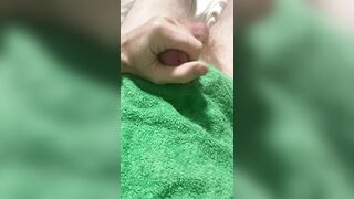 Waking up at 4am with a rampant schlong, I masturbated my hard-on and blasted jizm onto my spunk towel.