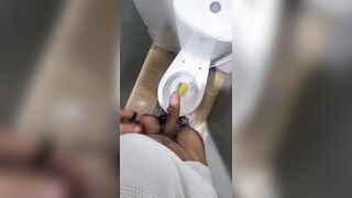 Stroking in a public douche