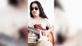 Loosened palms brush lips while guitar inflames fellate fantasies