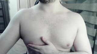 Bulky camboy ripples his muscled torso and palms