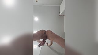 Very first, Roxana jacked off standing up, then came and used the leftover jism to oil up her booty