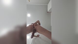 Very first, Roxana jacked off standing up, then came and used the leftover jism to oil up her booty