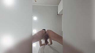 Very first, Roxana jacked off standing up, then came and used the leftover jism to oil up her booty