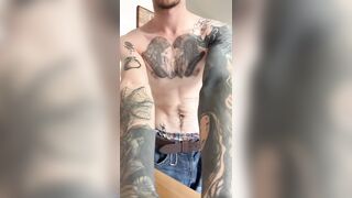 Unshaved tattooed man