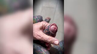 SMOOTH JERKING UNDERNEATH INKED FLESH, SPUNK DRIBBLES SLOW