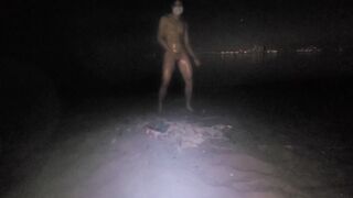 lubed japanese tugging on naked beach