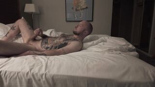 Brit tatted solo DILF plays with salami and ejaculates all over himself