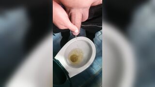 Queer stud peeing