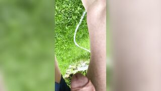 Lush uncircumcised dude fapping off in public park shoots enormous fountain