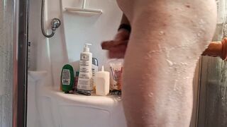 Heating up my pucker in the douche with a immense faux-cock