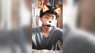 Lil femboy spitting over his gag ball while juggling on his faux-cock
