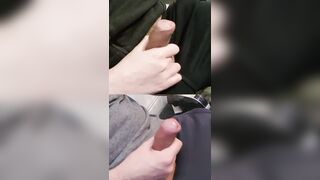 Jacking double enormous rods with precum glossy at the tips.