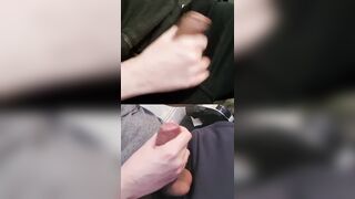 Jerking 2 girthy members with gooey precum at the crowns.