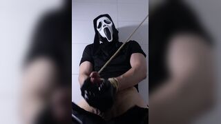 Ghostface-hooded roped up fapping in dungeon space