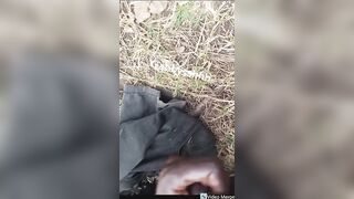 EBONY MAN OUTDOOR DISPLAYING DRAINING OFF
