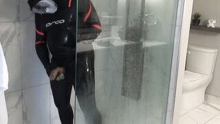 Orca toying with knob in motel bathroom