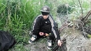 Super-cute Chinese homo twunk in a dark-hued-and-milky adidas tracksuit and Campus sneakers jerks and spunks outdoors