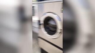 Bare frolicking with pipe in laundromat