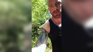 bulky bodybuilder ambling and fap outside