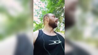 bulky bodybuilder ambling and fap outside