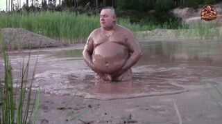 Dirt bathtub in deep quarry mess pond
