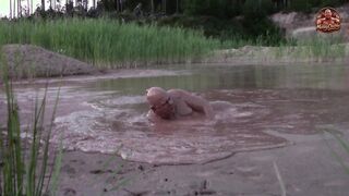 Dirt bathtub in deep quarry mess pond