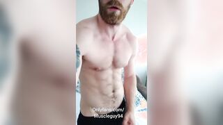 Beefy stud bodybuilder is showcasing his muscle and jack